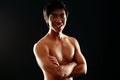 Smiling asian man with arms folded Royalty Free Stock Photo