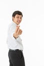 Smiling asian man showing fingers heart symbol and gesture
