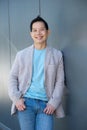 Smiling asian man standing outdoors Royalty Free Stock Photo