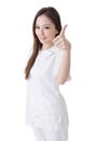 Smiling Asian nurse give an excellent sign Royalty Free Stock Photo