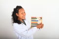 Smiling Asian scientist in lab coat counting on abacus