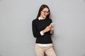 Smiling asian woman in business clothes and eyeglasses Royalty Free Stock Photo