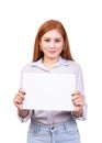 Smiling Asian woman holding blank white banner, business sign board  paper with clipping path. studio portrait Royalty Free Stock Photo