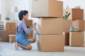 Smiling Asian Woman Packing Boxes Royalty Free Stock Photo