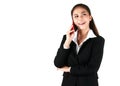 Smiling Asian woman wearing black suit holding hand talking on the smartphone. Businesswoman happy talk on the phone Cheerful and Royalty Free Stock Photo