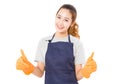 Smiling Asian Woman Wearing Rubber Gloves Giving Thumbs Up. Royalty Free Stock Photo