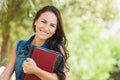 Smiling Attractive Mixed Race Teen Girl Student with School Books Royalty Free Stock Photo