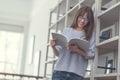 Smiling attractive woman reading a book Royalty Free Stock Photo