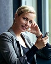 Smiling attractive woman texting