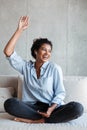 Smiling attractive young african woman wearing shirt Royalty Free Stock Photo