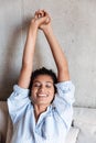 Smiling attractive young african woman wearing shirt relaxing Royalty Free Stock Photo