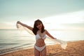 Smiling attractive young asian woman bikini sexy with shawl on a seaside beach tropical resting and relaxation travel lifestyle, H Royalty Free Stock Photo