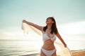 Smiling attractive young asian woman bikini sexy with shawl on a seaside beach tropical resting and relaxation travel lifestyle, H Royalty Free Stock Photo