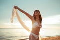 Smiling attractive young asian woman bikini sexy with shawl on a seaside beach tropical resting and relaxation travel lifestyle, H Royalty Free Stock Photo
