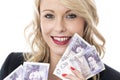 Smiling Attractive Young Woman Holding Money