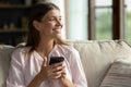 Smiling attractive young woman toasting with glass of sparkling wine. Royalty Free Stock Photo