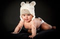 Smiling baby in bear cap Royalty Free Stock Photo