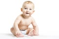 Smiling baby-boy in a diaper sitting on the floor. On a white background with reflection Royalty Free Stock Photo