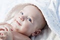 Smiling baby boy wrapped bath towel after bath Royalty Free Stock Photo