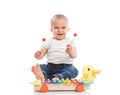 Smiling baby child playing metallophone Royalty Free Stock Photo