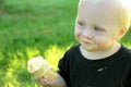 Smiling Baby Eating Ice Cream Cone Royalty Free Stock Photo