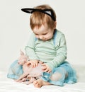 Smiling baby girl with kitten Royalty Free Stock Photo