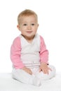 Smiling baby girl on the white Royalty Free Stock Photo