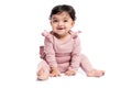 Smiling baby posing on studio floor. Royalty Free Stock Photo