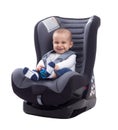 Smiling baby smiling and keep safe in car seat Royalty Free Stock Photo