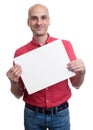 Smiling bald man holding a banner