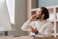 smiling bearded businessman in eyeglasses gesturing Royalty Free Stock Photo