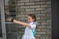 Smiling beatiful preteen girl taking a selfie outdoors. Child taking a self portrait with mobile phone. technology Royalty Free Stock Photo