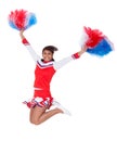 Smiling beautiful cheerleader with pompoms