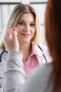 Smiling beautiful female medicine doctor explain Royalty Free Stock Photo