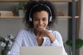 Smiling beautiful millennial african businesswoman holding video call. Royalty Free Stock Photo