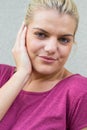 Smiling and beautiful woman over Wall - Building Feature Royalty Free Stock Photo