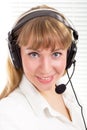 Smiling beautiful woman with phone headset Royalty Free Stock Photo