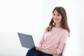 Smiling beautiful woman portrait with laptop