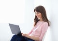 Smiling beautiful woman portrait with laptop