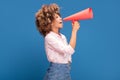 Afro girl screaming by megaphone. Royalty Free Stock Photo