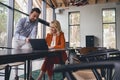 Pleased focused businesswoman staring at a laptop screen Royalty Free Stock Photo