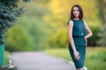 Smiling beautiful young woman wearing necklace posing outdoor Royalty Free Stock Photo