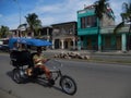 SMILING TAXI RICKSHAW DRIVER, CIENFUEGOS, CUBA