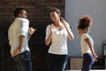 Smiling biracial family with daughter dancing in living room Royalty Free Stock Photo