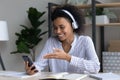 Smiling biracial female talk on cellphone call