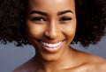 Smiling black female fashion model with curly hair Royalty Free Stock Photo