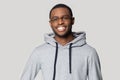 Smiling black male in hoodie posing for picture Royalty Free Stock Photo