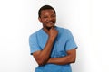 Smiling black surgeon doctor bearded man in blue coat with isolated on white background