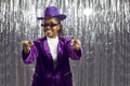 Smiling black woman entertainer point at screen Royalty Free Stock Photo