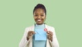 Smiling black woman hold envelope with unread notification